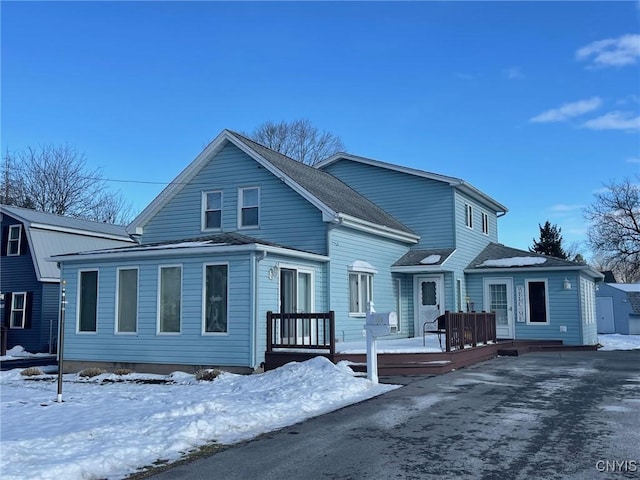 view of front of house with a wooden deck