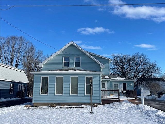 view of snow covered property