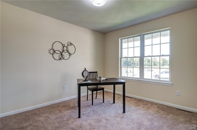 view of carpeted office space