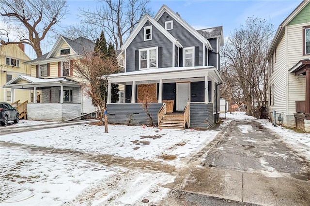 view of property with a porch