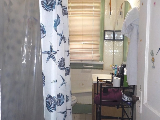 bathroom with a shower with shower curtain