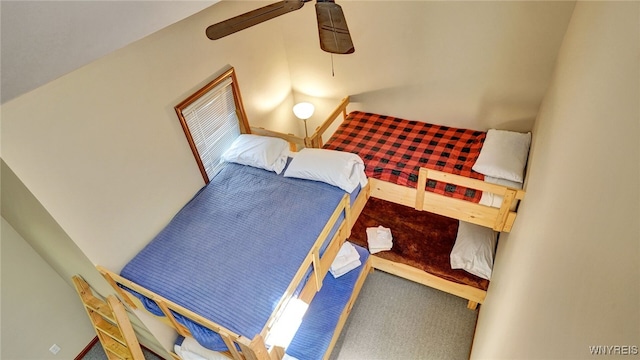 bedroom with ceiling fan and carpet flooring