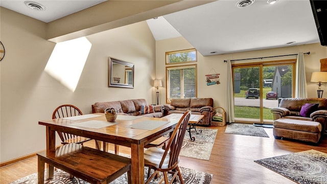 dining space featuring light hardwood / wood-style flooring