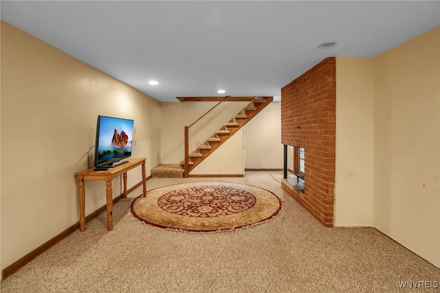 basement featuring light carpet