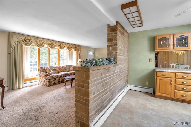 interior space with baseboard heating and light colored carpet