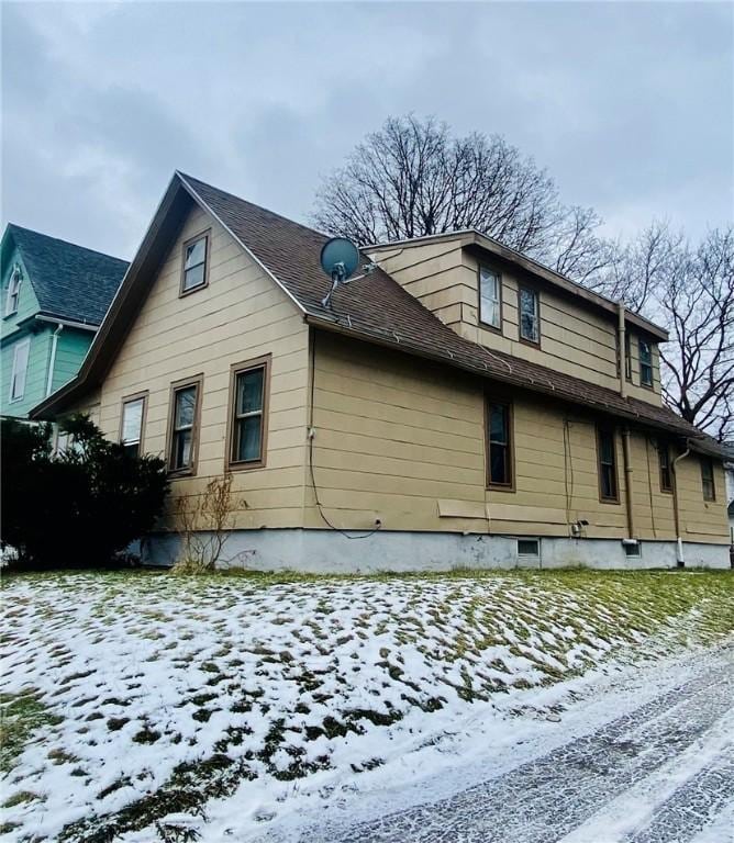 view of snow covered property