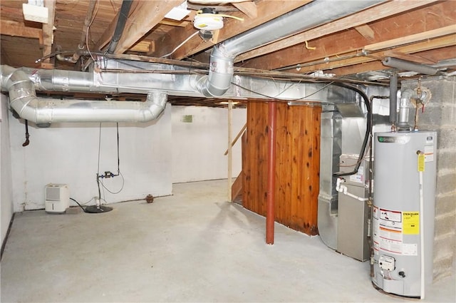 basement featuring heating unit and gas water heater