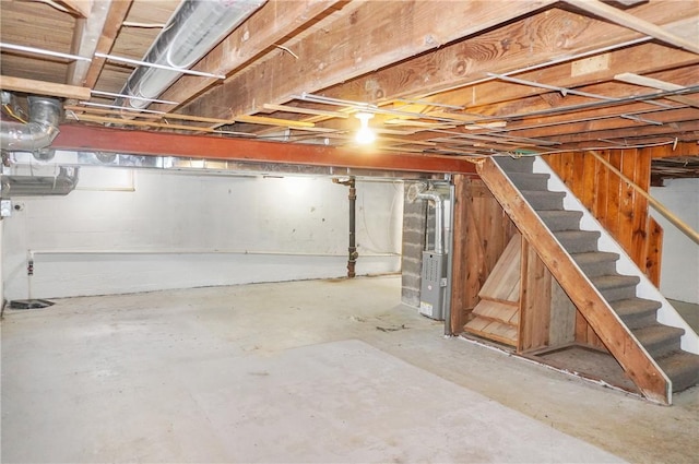 basement featuring heating unit