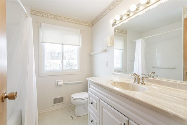 full bathroom with toilet, vanity, shower / tub combo, and a healthy amount of sunlight