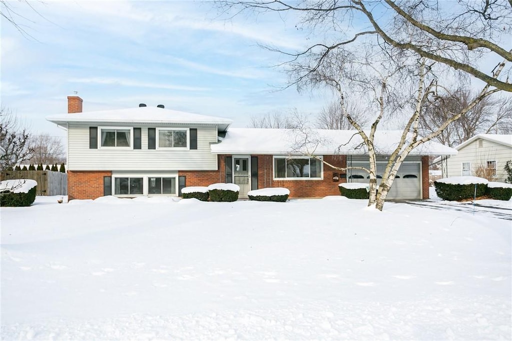 tri-level home featuring a garage