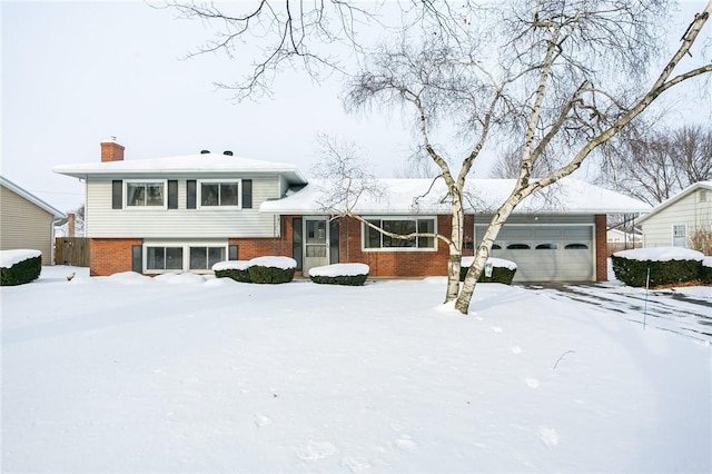 tri-level home featuring a garage