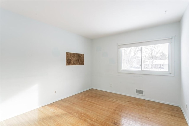 empty room featuring light hardwood / wood-style floors