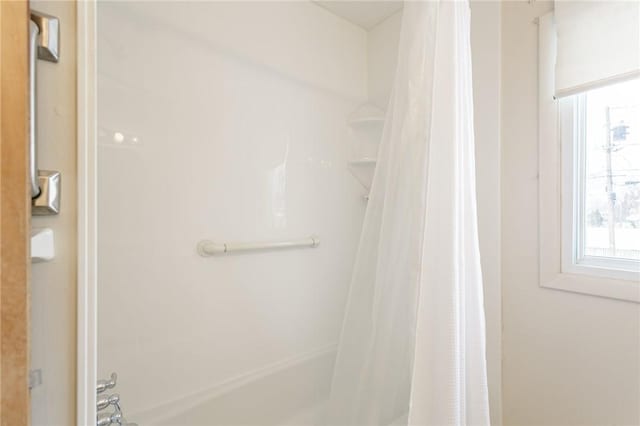 bathroom featuring a shower with curtain