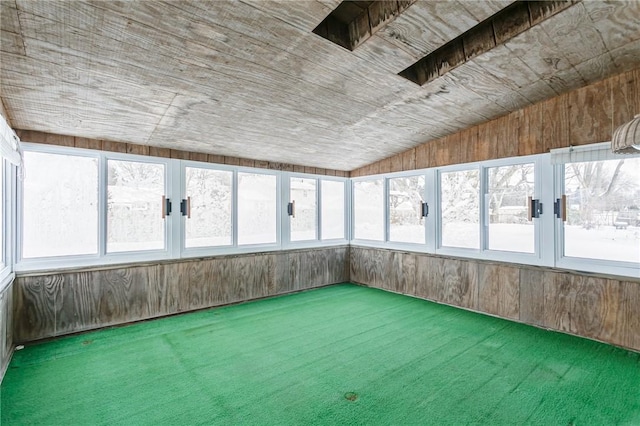 unfurnished sunroom with plenty of natural light