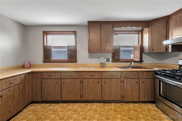 kitchen with gas range and sink