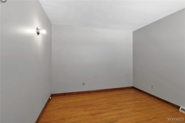 unfurnished room featuring light hardwood / wood-style floors