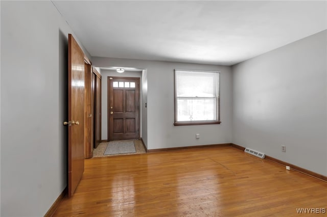 entrance foyer with light hardwood / wood-style flooring