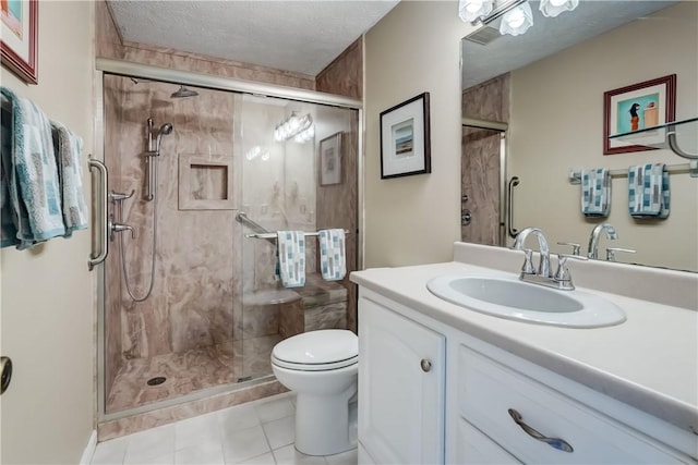 bathroom with toilet, tile patterned flooring, walk in shower, a textured ceiling, and vanity