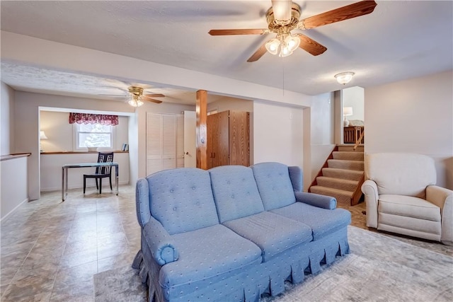 living room with ceiling fan