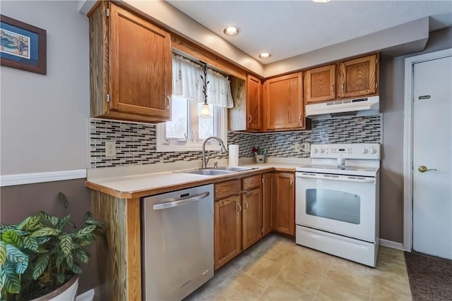 kitchen featuring stainless steel dishwasher, white electric range, sink, and tasteful backsplash