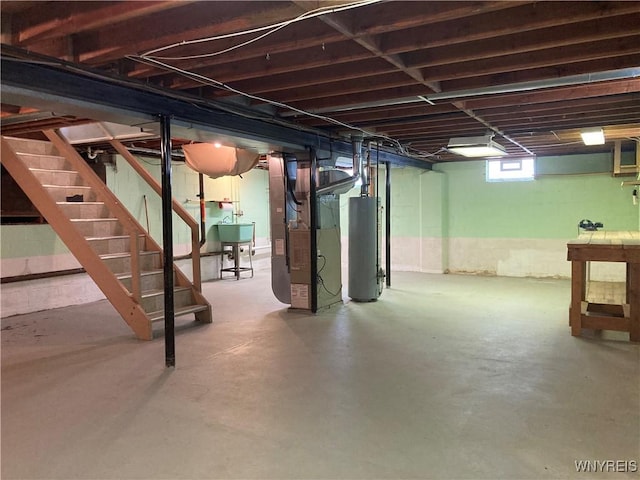 basement featuring heating unit and gas water heater