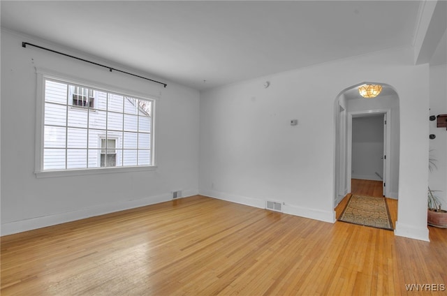 unfurnished room with light hardwood / wood-style flooring