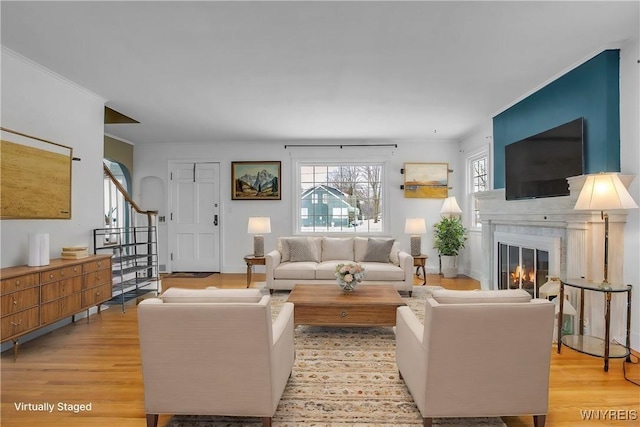 living room with light hardwood / wood-style floors