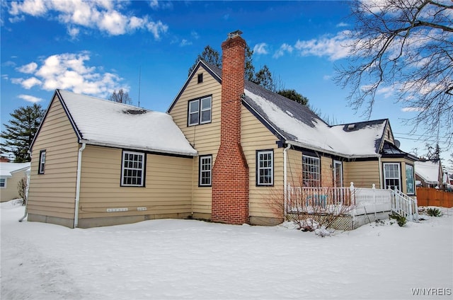 view of snow covered property