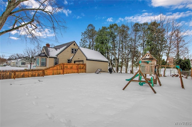 view of snow covered playground