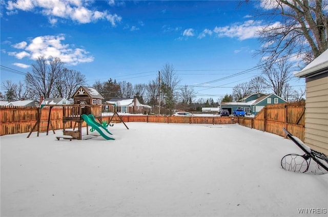 view of snow covered playground