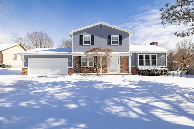 front of property featuring a garage