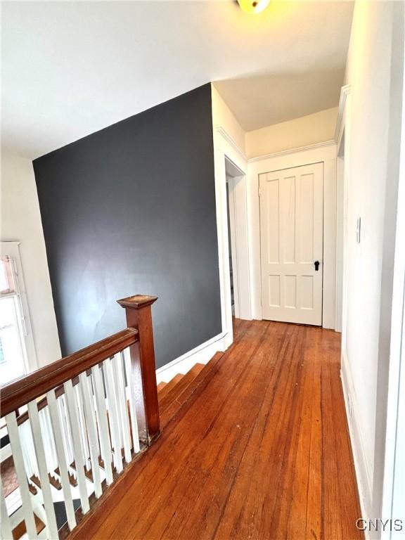 hallway featuring hardwood / wood-style flooring