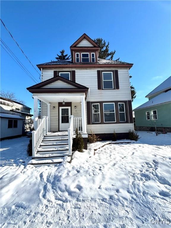 front of property featuring a porch