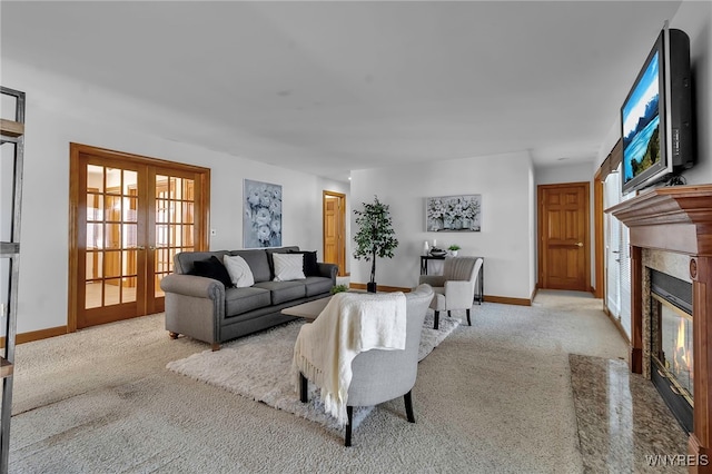 carpeted living room featuring french doors