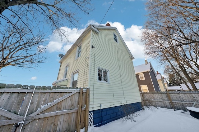 view of snow covered property