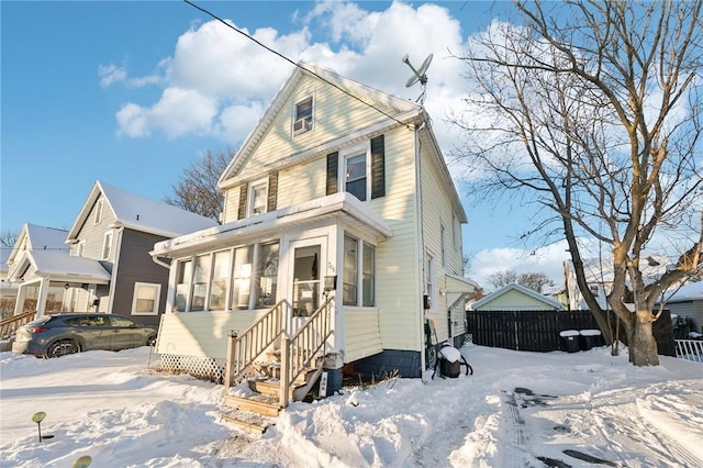 front of property with a sunroom