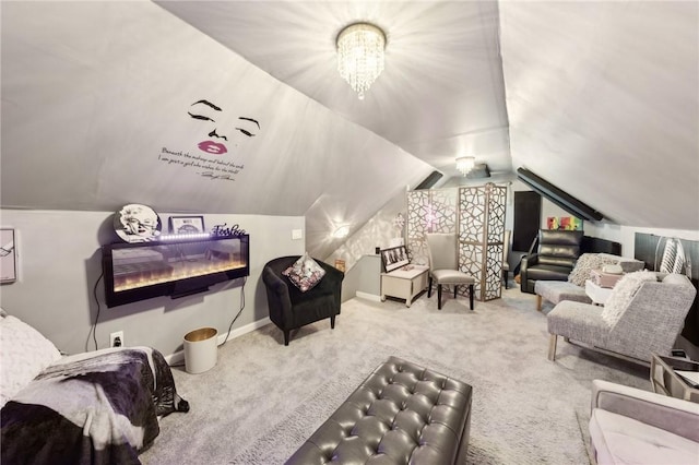 interior space featuring carpet floors, lofted ceiling, and an inviting chandelier