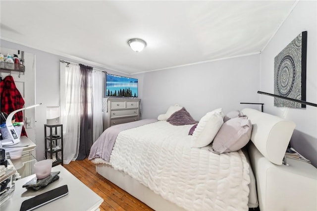 bedroom with light wood-type flooring