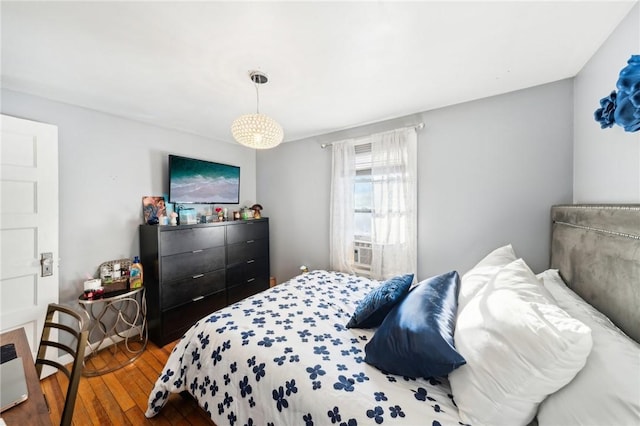 bedroom featuring wood-type flooring