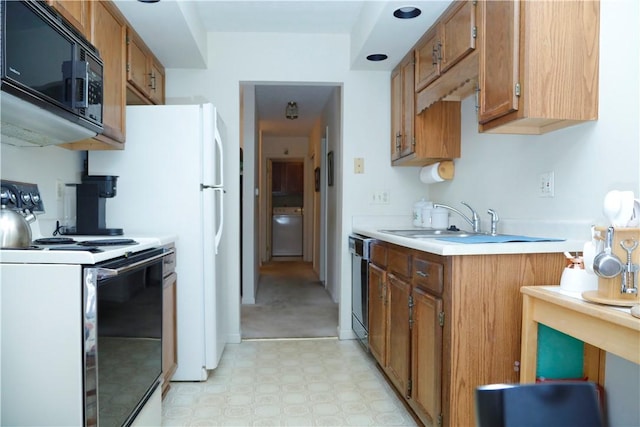 kitchen with sink, stainless steel dishwasher, and electric stove