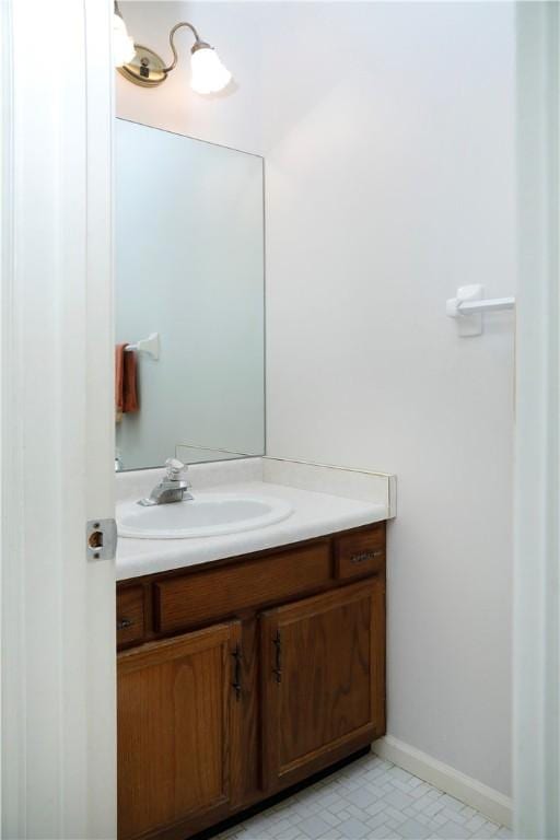 bathroom with vanity and tile patterned flooring