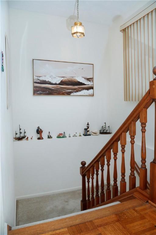 stairs with parquet flooring