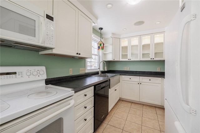 kitchen featuring light tile patterned floors, decorative light fixtures, white cabinets, and white appliances