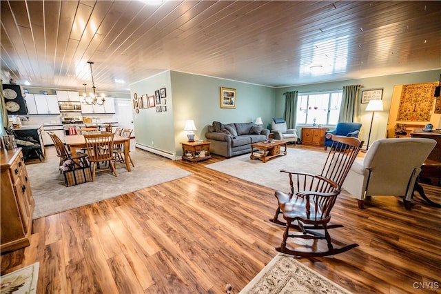 living area featuring a notable chandelier, baseboard heating, wood ceiling, and light wood-style flooring
