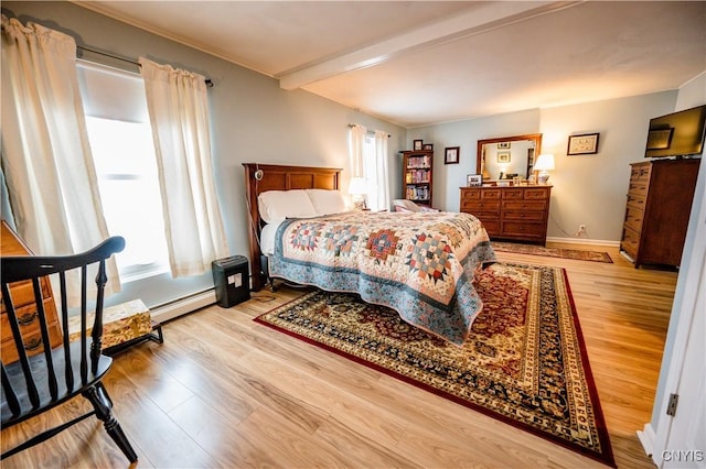 bedroom with light wood-type flooring, beamed ceiling, a baseboard radiator, and multiple windows