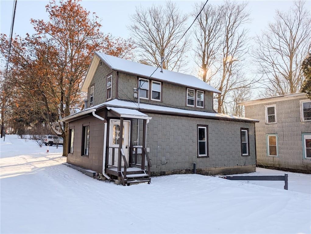 view of snow covered property