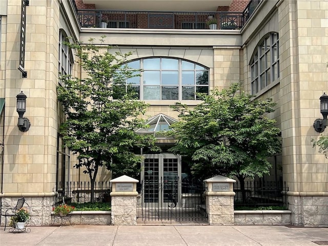 doorway to property featuring a balcony