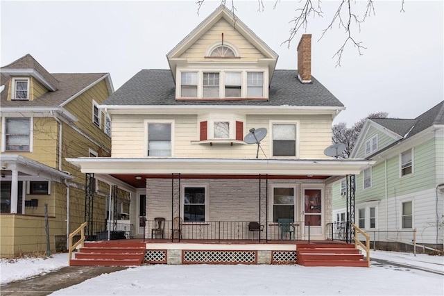 view of front of property featuring covered porch