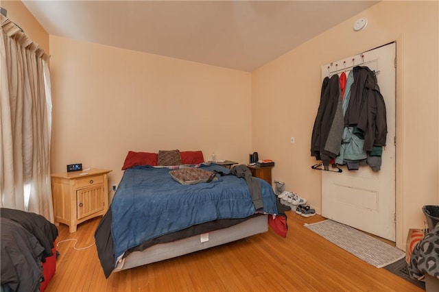 bedroom with light hardwood / wood-style flooring