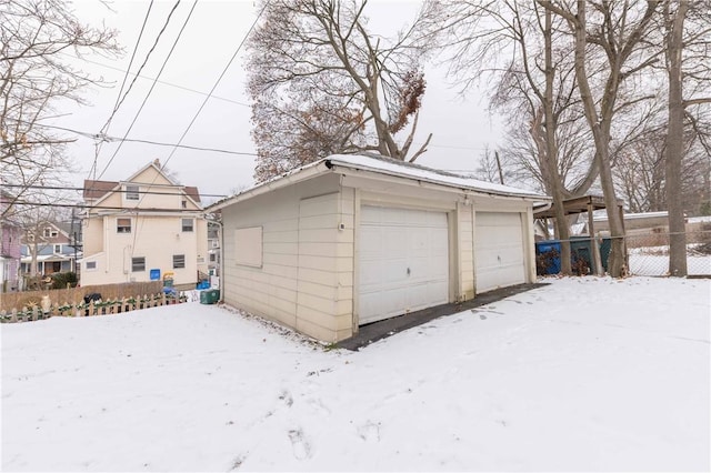 view of snow covered garage